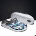 Unisex beach and outdoor slippers by MANDOTOS INTERNATIONAL, featuring comfortable slip-on design and durable rubber soles.