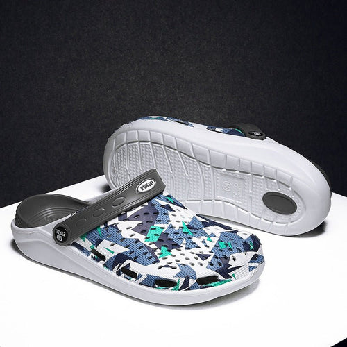 Unisex beach and outdoor slippers from MANDOTOS INTERNATIONAL with comfortable design and casual slip-on style.