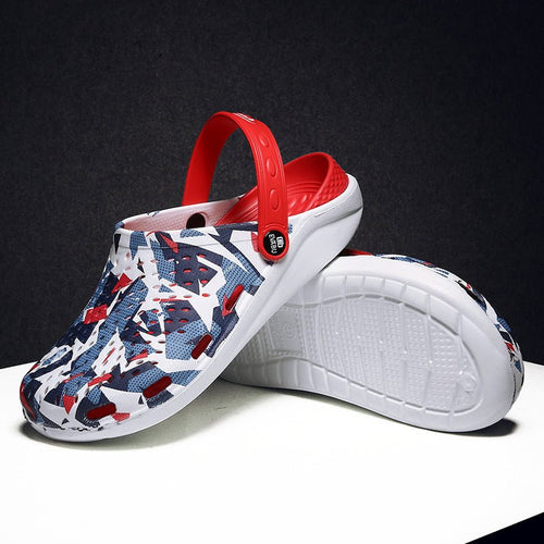 Unisex beach and outdoor slippers by MANDOTOS INTERNATIONAL, featuring comfortable slip-on design and durable sole for outdoor wear.