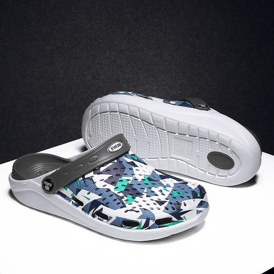 Unisex beach and outdoor slippers by MANDOTOS INTERNATIONAL, featuring comfortable straps and durable sole for casual wear.