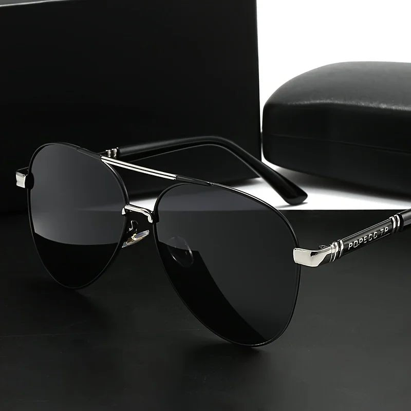 Unisex polarized stylish eyewear by MANDOTOS INTERNATIONAL, suitable for travel and driving, with sleek design and tinted lenses.