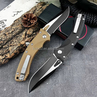 Mandotos International versatile folding hunting knife with a portable pocket design for everyday carry and outdoor use.
