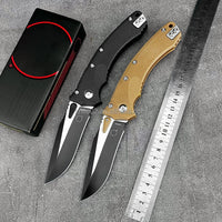 Mandotos International folding hunting knife with portable design, ideal for daily pocket EDC and outdoor activities.
