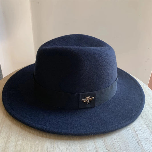 Vintage wool fedora hat with feather band by Mandotos International, ideal for formal events and weddings.
