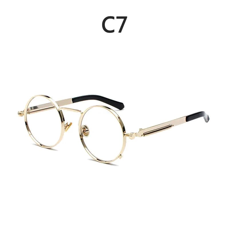 Vintage steampunk circular shades by MANDOTOS INTERNATIONAL with metal frames and tinted lenses, stylish retro eyewear.