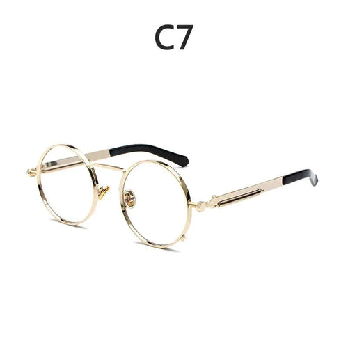 Vintage steampunk circular shades by MANDOTOS INTERNATIONAL with metal frames and tinted lenses, stylish retro eyewear.