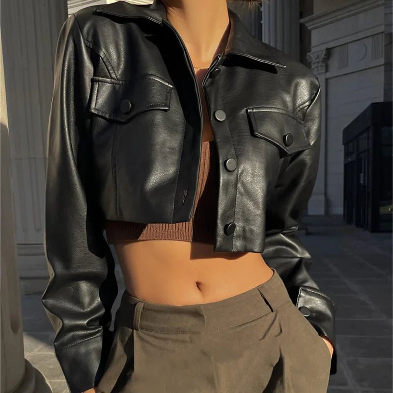 Mandotos International Vogue PU cropped jacket in black, featuring a stylish, fitted design with a collar and front zipper.