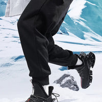 Winter men's waterproof slippers with plush lining by MANDOTOS INTERNATIONAL, featuring cozy, slip-on sneaker design for cold weather.