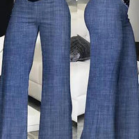 Women flared pants by MANDOTOS INTERNATIONAL featuring high waist, sheer mesh patches, wide-leg style, perfect for office or casual wear.