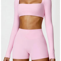 Women's long sleeve fitness T-shirt by MANDOTOS INTERNATIONAL, gym push-up top, lightweight and comfortable for active workouts.