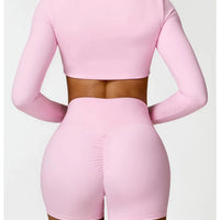 Women's long sleeve fitness T-shirt by MANDOTOS INTERNATIONAL, gym push-up top, designed for active wear and support.