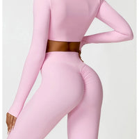 Women's long sleeve fitness T-shirt from MANDOTOS INTERNATIONAL, gym-ready push-up top for active wear.