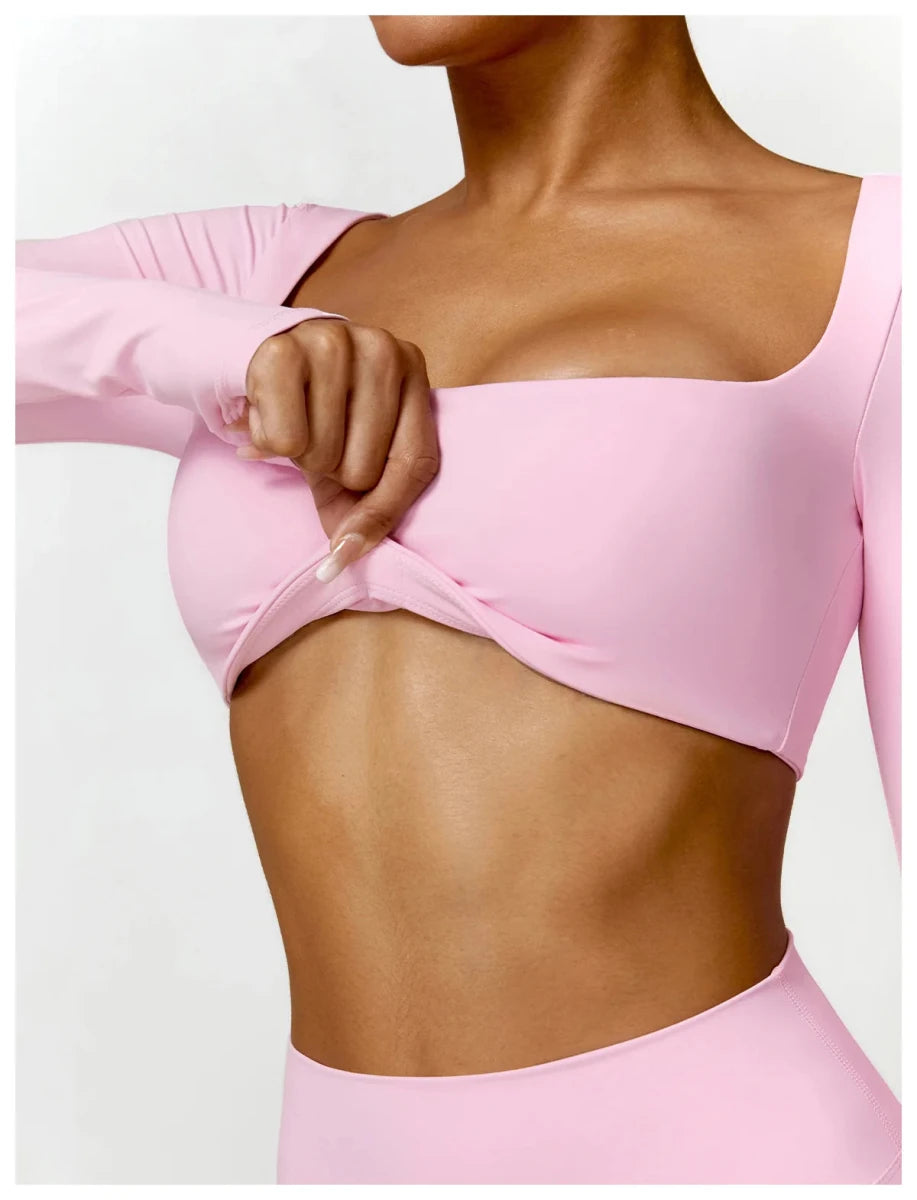 Women's long sleeve fitness T-shirt from MANDOTOS INTERNATIONAL, designed for gym workouts and push-up support.