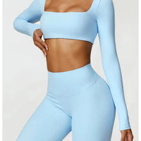 Women's long sleeve fitness T-shirt by MANDOTOS INTERNATIONAL, gym push-up top, made for active workouts and comfortable movement.