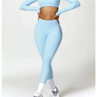 Women's long sleeve fitness T-shirt by MANDOTOS INTERNATIONAL, perfect for gym workouts and push-up exercises.