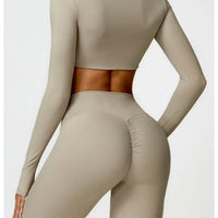 Women's long sleeve fitness T-shirt by MANDOTOS INTERNATIONAL, designed for gym workouts and push-up support.