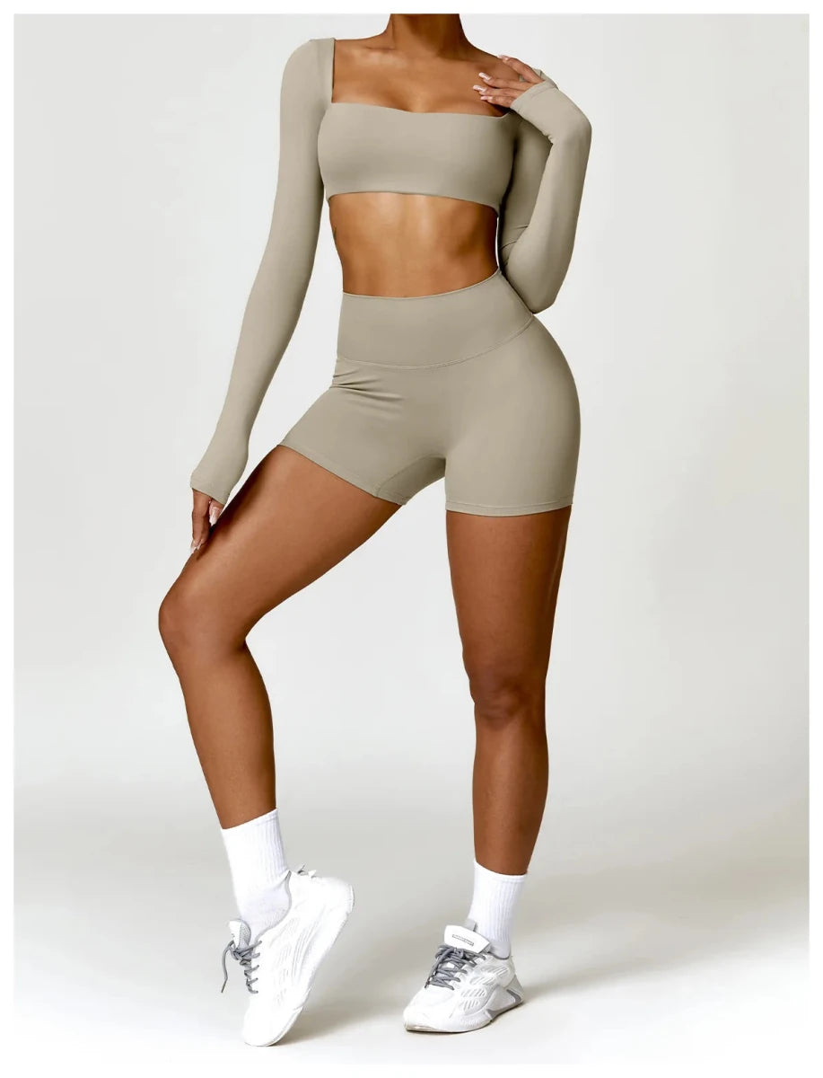 Women's long sleeve fitness T-shirt by MANDOTOS INTERNATIONAL, gym workout top with push-up design, versatile activewear for women.