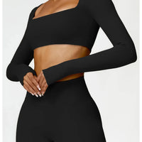 Women's long sleeve fitness T-shirt by MANDOTOS INTERNATIONAL, gym push-up top, designed for active women and comfortable workout wear.