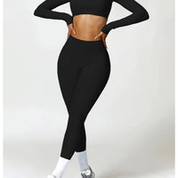 Women's long sleeve fitness T-shirt by MANDOTOS International, gym push-up top, made for active wear and workout comfort.