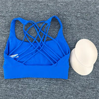 Women's shockproof yoga crop top by MANDOTOS INTERNATIONAL, anti-sweat gym sports bra with supportive fit and breathable fabric.