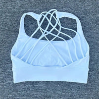 Women's shockproof yoga crop top and anti-sweat gym sports bra by MANDOTOS INTERNATIONAL, featuring a fitted design and moisture-wicking fabric.