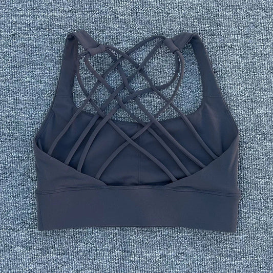 Mandotos International women's shockproof yoga crop top with anti-sweat fabric, designed for gym and sports activities.