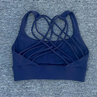 Women's shockproof yoga crop top by MANDOTOS INTERNATIONAL, anti-sweat gym sports bra with breathable fabric and supportive fit.
