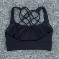 Mandotos International women's shockproof yoga crop top with anti-sweat fabric, designed for gym and sports activities.