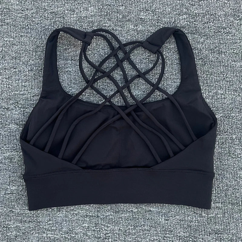 Mandotos International women's shockproof yoga crop top with anti-sweat fabric, designed for gym and sports activities.