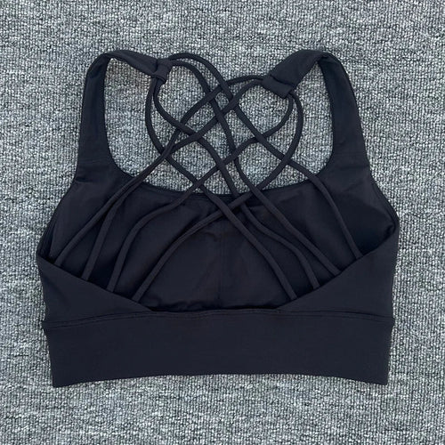 Mandotos International women's shockproof yoga crop top with anti-sweat fabric, designed for gym and sports activities.