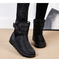 Women's waterproof winter snow boots by MANDOTOS INTERNATIONAL featuring non-slip soles and warm platform design.