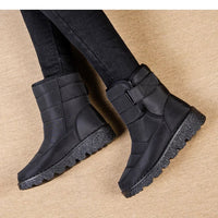 Women's waterproof winter snow boots by MANDOTOS INTERNATIONAL with non-slip soles, warm lining, and platform design.