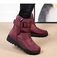 Women's waterproof winter snow boots by MANDOTOS INTERNATIONAL with non-slip soles, ankle height, warm platform design, and stylish look.
