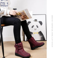 Women's waterproof winter snow boots from MANDOTOS INTERNATIONAL with non-slip soles, ankle height, warm lining, and platform design.