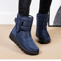 Women's waterproof winter snow boots by MANDOTOS INTERNATIONAL featuring non-slip soles, warm lining, ankle height, and platform style.