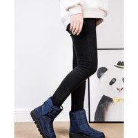 Women's waterproof winter snow boots by MANDOTOS INTERNATIONAL with non-slip soles and warm platform design.