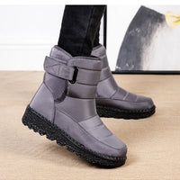 Women's waterproof winter snow boots by MANDOTOS INTERNATIONAL featuring non-slip soles, warm insulation, and stylish ankle platform design.