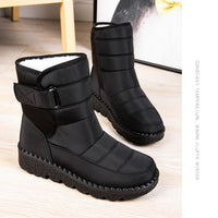 Women's waterproof winter snow boots with non-slip soles, warm platform design, ankle height, from MANDOTOS INTERNATIONAL.