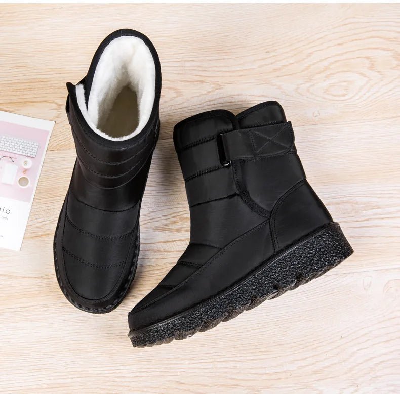 Women's waterproof winter snow boots by MANDOTOS INTERNATIONAL with non-slip soles, warm lining, and platform design.