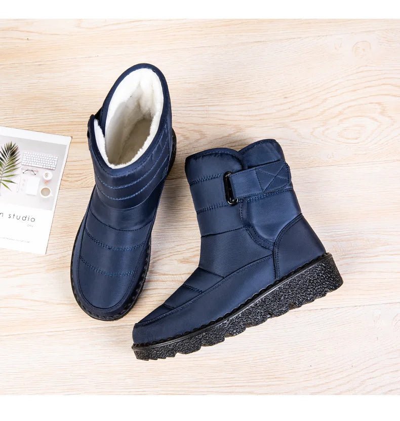 Women's waterproof winter snow boots by MANDOTOS INTERNATIONAL with non-slip soles, warm insulation, and stylish ankle platform design.