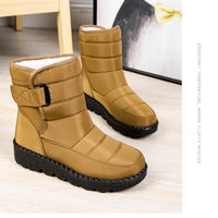Women's waterproof winter snow boots from MANDOTOS INTERNATIONAL with non-slip soles, warm lining, and platform design for cold weather.