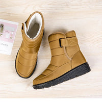 Women's waterproof winter snow boots by MANDOTOS INTERNATIONAL with non-slip soles, warm lining, and platform heel.