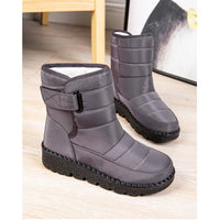 Women's waterproof winter snow boots by MANDOTOS INTERNATIONAL with non-slip soles, warm ankle platform shoes for cold weather.