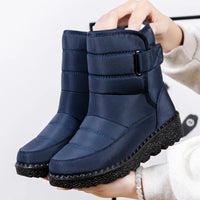 Women's waterproof winter snow boots by MANDOTOS INTERNATIONAL with non-slip soles, warm insulation, and stylish ankle platform design.