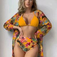 Mandotos International three-piece floral printed bikini swimwear set with cover-up, designed for women’s beachwear and swim fashion.