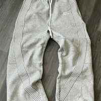 Mandotos International Y2K embroidered black gray camo tactical jogger pants with drawstring for men and women.