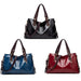 Mandotos Kathie leather tote purse with spacious interior, sturdy handles, and elegant design in natural leather finish.