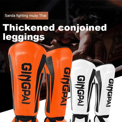 Mandotos kickboxing shin guards for Muay Thai, padded leg protectors for kickboxing training and competition.