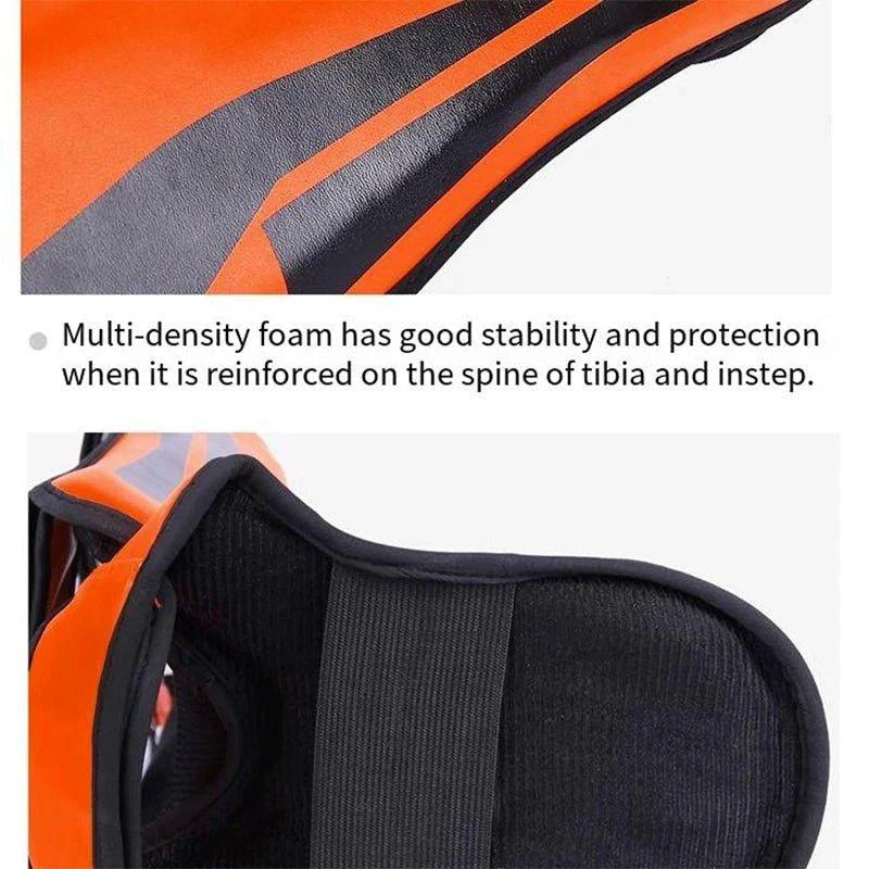 Mandotos kickboxing shin guards for Muay Thai, featuring padded leg protectors with adjustable straps for secure fit and protection.