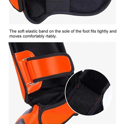 Mandotos kickboxing shin guards and Muay Thai leg protectors on a white background, showing the durable, padded design for combat sports.